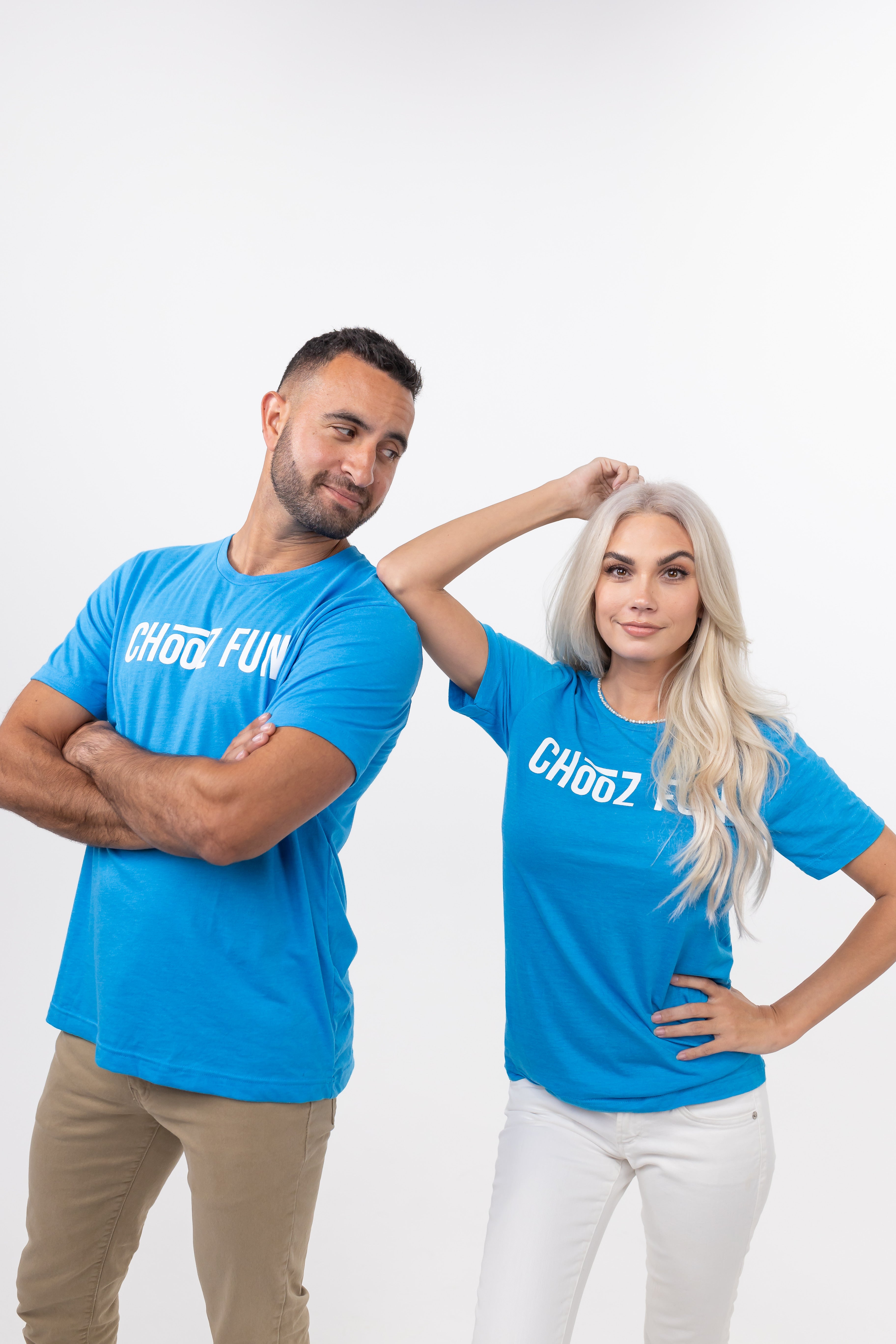 Couple rocking the Neon Blue FUN Mark Tee with crossed arms and confidence. Big tee energy—activated.