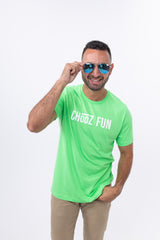 Man in the CHooZ FUN, FUN Mark Tee – Neon Green rocking mirrored shades. Fluorescent threads meet feel-good confidence.