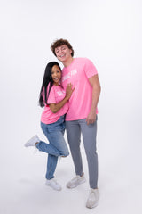Matching tees, matching energy. Neon pink, made for moments like this.