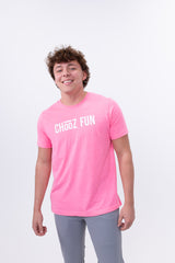 Men’s Fun Mark tee in neon pink, styled casually in a white backdrop studio. Comfortable, confident, and made for bold weekends.