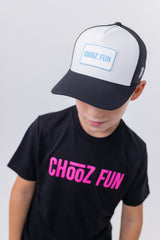 Youth wearing the Lil’ FUN Mark Hat – White with Blue Patch – front view