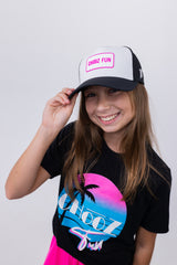 Girl smiling in ChooZ FUN tee wearing Lil’ FUN Mark Hat – White with Pink Patch – front view